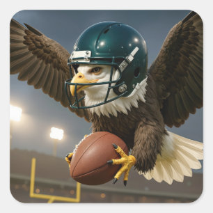 Sticker Carré Aigle avec un ballon de football dans un stade de