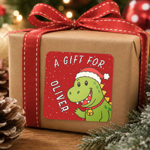 Sticker Carré Cadeau de Noël avec le nom des enfants dinosaure m