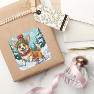 Sticker Carré Corgi joyeux bondissant dans la neige avec un Pom 