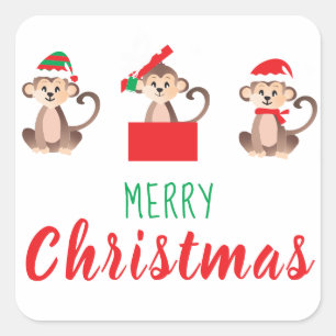 Sticker Carré Joyeux singe de Noël portant le chapeau du Père 