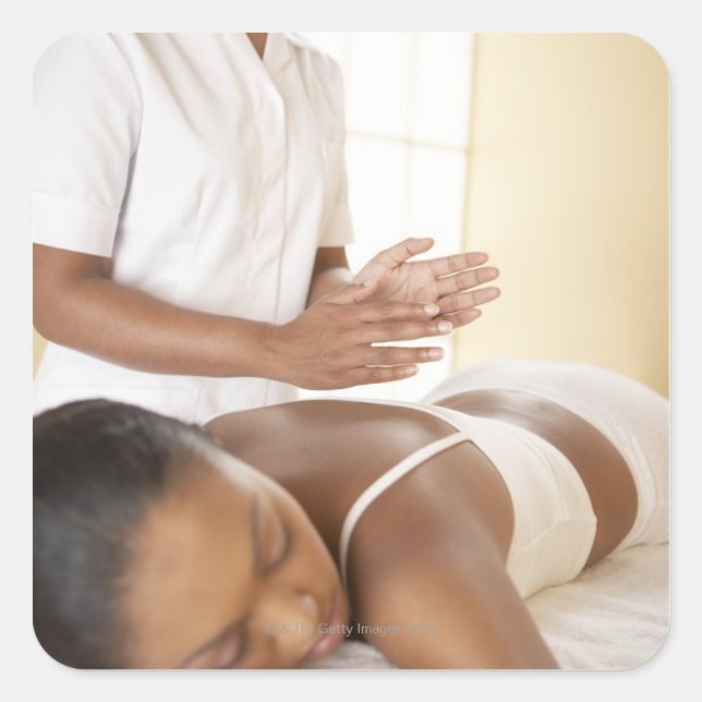 Sticker Carré Massage sur le dos. Femme recevant un massage du d (Devant)