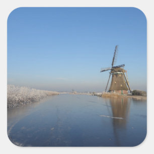 Sticker Carré Paysage hivernal avec moulin à vent et glace