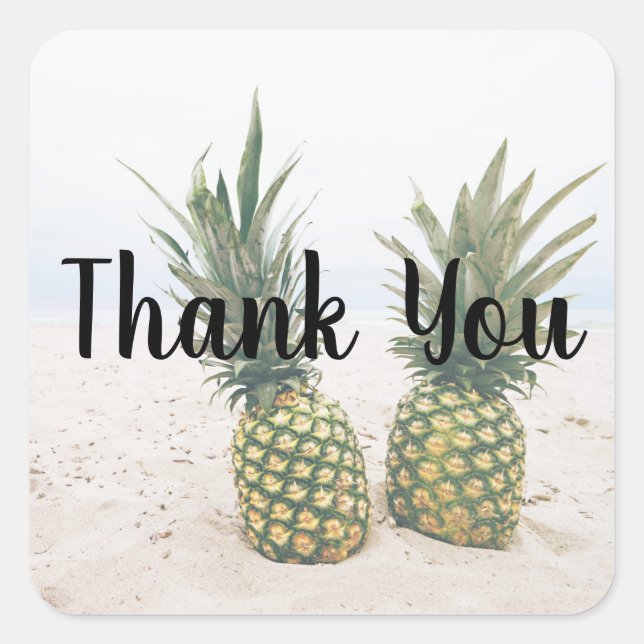 Sticker Carré Photo de 2 ananas sur un Merci de plage (Devant)