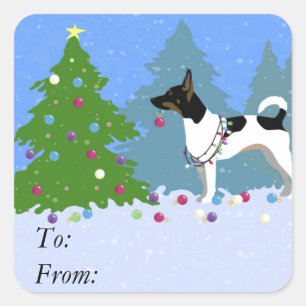 Sticker Carré Rat Terrier décorant un arbre de Noël en forêt