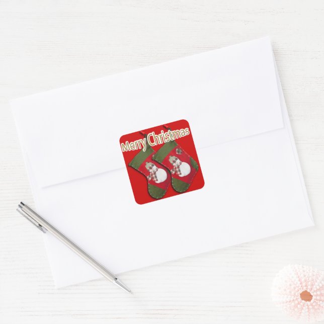 Sticker Carré Un bonhomme de neige à Noël s'emplit sur le rouge (Enveloppe)