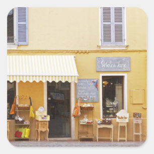 Sticker Carré Une rue de marché dans la vieille ville avec un ma