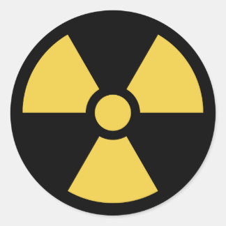 Sticker circulaire radioactif jaune sur noir