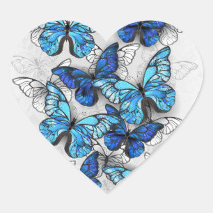 Sticker Cœur Composition des papillons blancs et bleus