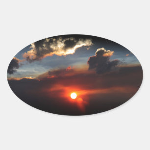 Sticker Ovale belle photo de coucher de soleil enfumé