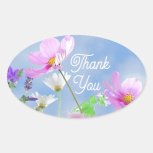 Sticker Ovale Fleurs sauvages ciel bleu merci