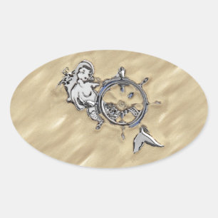 Sticker Ovale Sirène d'argent dans le sable