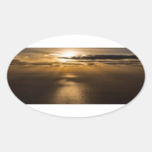 Sticker Ovale Sunrise above the Atlantic ocean