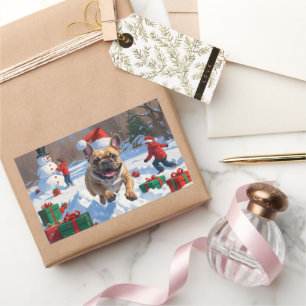 Sticker Rectangulaire Bouledogue français courant dans la neige avec un