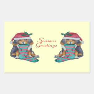 Sticker Rectangulaire chiot noir et brun mignon vêtu pour noël