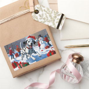 Sticker Rectangulaire Dalmatien courant dans la neige avec un chapeau de