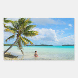Sticker Rectangulaire Femme sous un bâton rectangle de palmier
