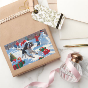 Sticker Rectangulaire Springer Spaniel courant dans la neige avec un cha