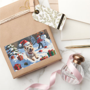 Sticker Rectangulaire Terrier Cairn courant dans la neige avec un chapea