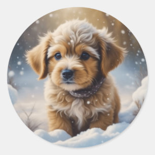 Sticker Rond adorable chiot de Noël dans une nuit de neige