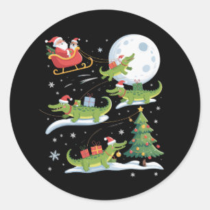 Sticker Rond Alligator à cheval sur le traîneau du Père Noël No