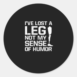 Sticker Rond Amputé J'ai perdu une jambe pas mon sens de l'Humo