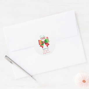Sticker Rond Bain de bébé au Père Noël arc et chapeau de Noël