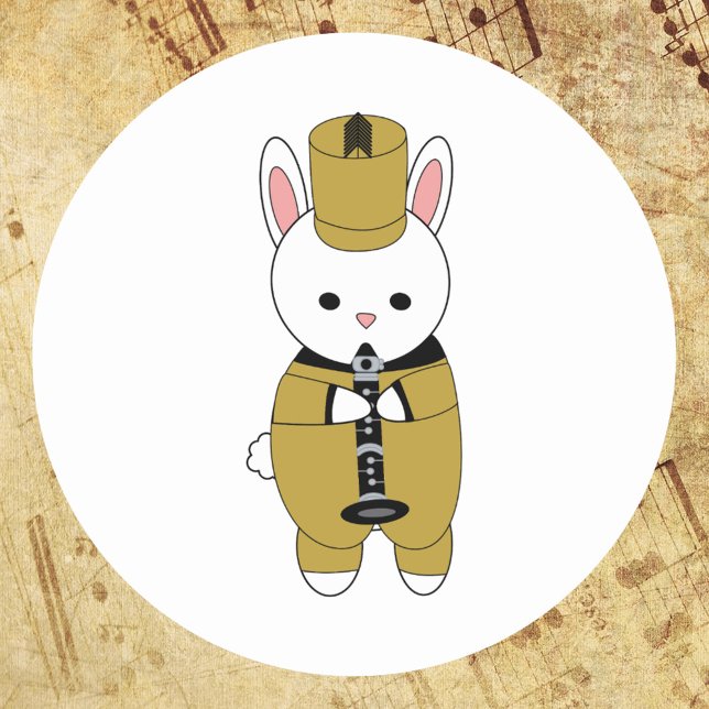Sticker Rond Bande de Marquage de lapin Clarinet Gold Noir (A sticker of a rabbit playing the clarinet while wearing a black and gold marching band uniform)