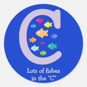 Sticker Rond Beaucoup de poissons dans le "C"_poisson rouge mul