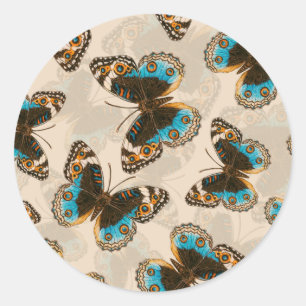 Sticker Rond Bleu motif papillon Pansy sur blanc