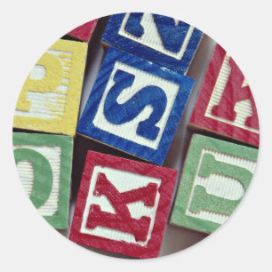 Sticker Rond Blocs en bois avec des alphabets pour des enfants