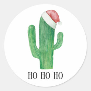 Sticker Rond Cactus de Noël. Casquette rouge des vacances d'hiv