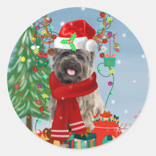 Sticker Rond Cairn Terrier Chien en neige avec cadeaux de Noël