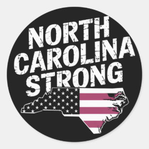 Sticker Rond Caroline du Nord forte avec le drapeau de l'État d