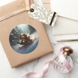 Sticker Rond Cavalier King Charles Spaniel neige de Noël