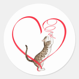 Sticker Rond Chat avec ruban cardiaque