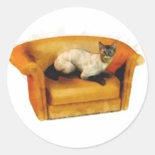 Sticker Rond Chat de canapé de Siamese
