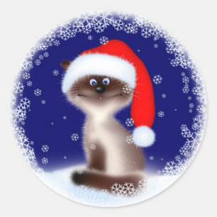 Sticker Rond Chat de Noël dans le casquette de Père Noël