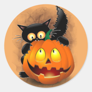Sticker Rond Chat Fun Halloween Caractère mordant un Citrouille