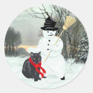 Sticker Rond Chat noir et neige