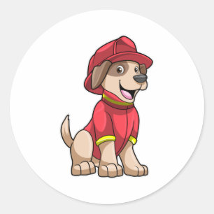 Sticker Rond Chien comme pompier avec casque d'incendie