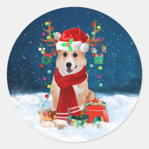 Sticker Rond Chien de Corgi en neige avec cadeaux de Noël
