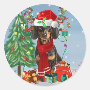 Sticker Rond Chien de Dachshund en neige avec Noël