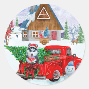 Sticker Rond Chien Husky Sibérien Dans Un Camion De Livraison D