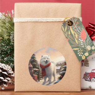 Sticker Rond Chien Samoyé à Noël de neige