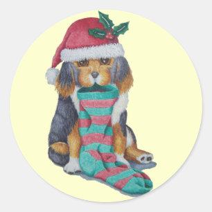 Sticker Rond chiot noir et brun mignon vêtu pour noël