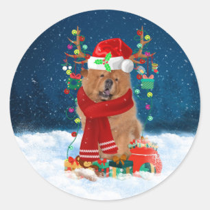 Sticker Rond Chow Chow Chien en neige avec cadeaux de Noël