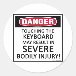 Sticker Rond Clavier de danger