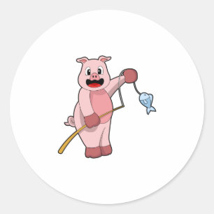 Sticker Rond Cochon à la pêche avec la canne à pêche et le pois