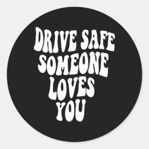 Sticker Rond Conduire en sécurité Quelqu'un vous aime sur le do