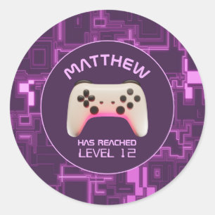 Sticker Rond Contrôleur de jeu vidéo violet et blanc